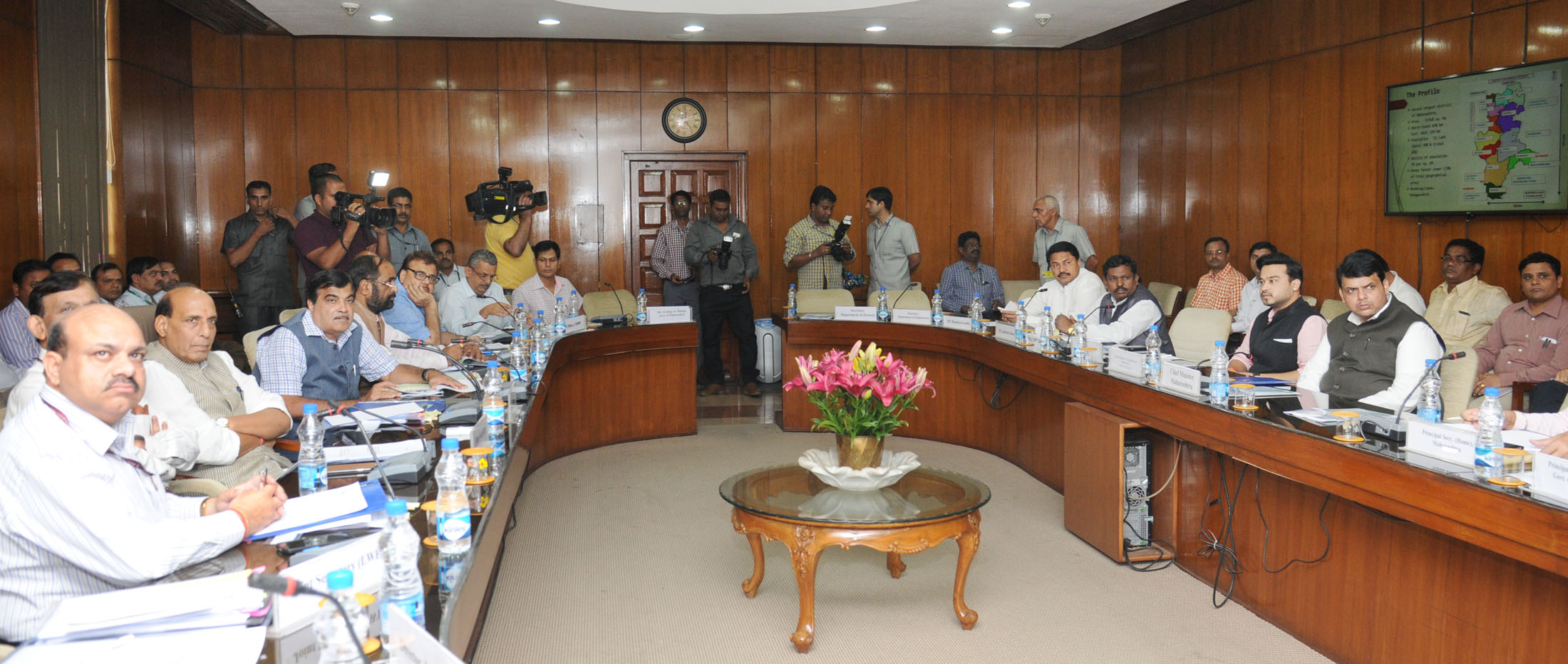 The Union Home Minister, Shri Rajnath Singh chaired a meeting on 'Security arrangement available to various private companies engaged in iron ore and dolomite mining in Gadchiroli and Gondia districts of Maharashtra', in New Delhi on August 27, 2015.  	The Union Minister for Road Transport & Highways and Shipping, Shri Nitin Gadkari, the Chief Minister of Maharashtra, Shri Devendra Fadnavis, the Minister of State for Chemicals & Fertilizers, Shri Hansraj Gangaram Ahir, the Union Home Secretary, Shri L.C. Goyal and Senior Officials of respective Union Ministries are also seen.