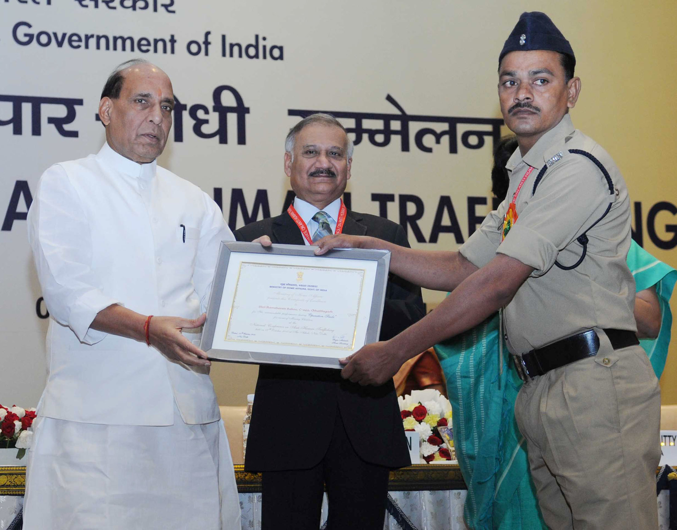 The Union Home Minister, Shri Rajnath Singh presented the certificates to top performers of Operation Smile, at the inauguration of the National Conference on Anti Human Trafficking, in New Delhi on October 07, 2015. 	The Director, CBI, Shri Anil Kumar Sinha is also seen.