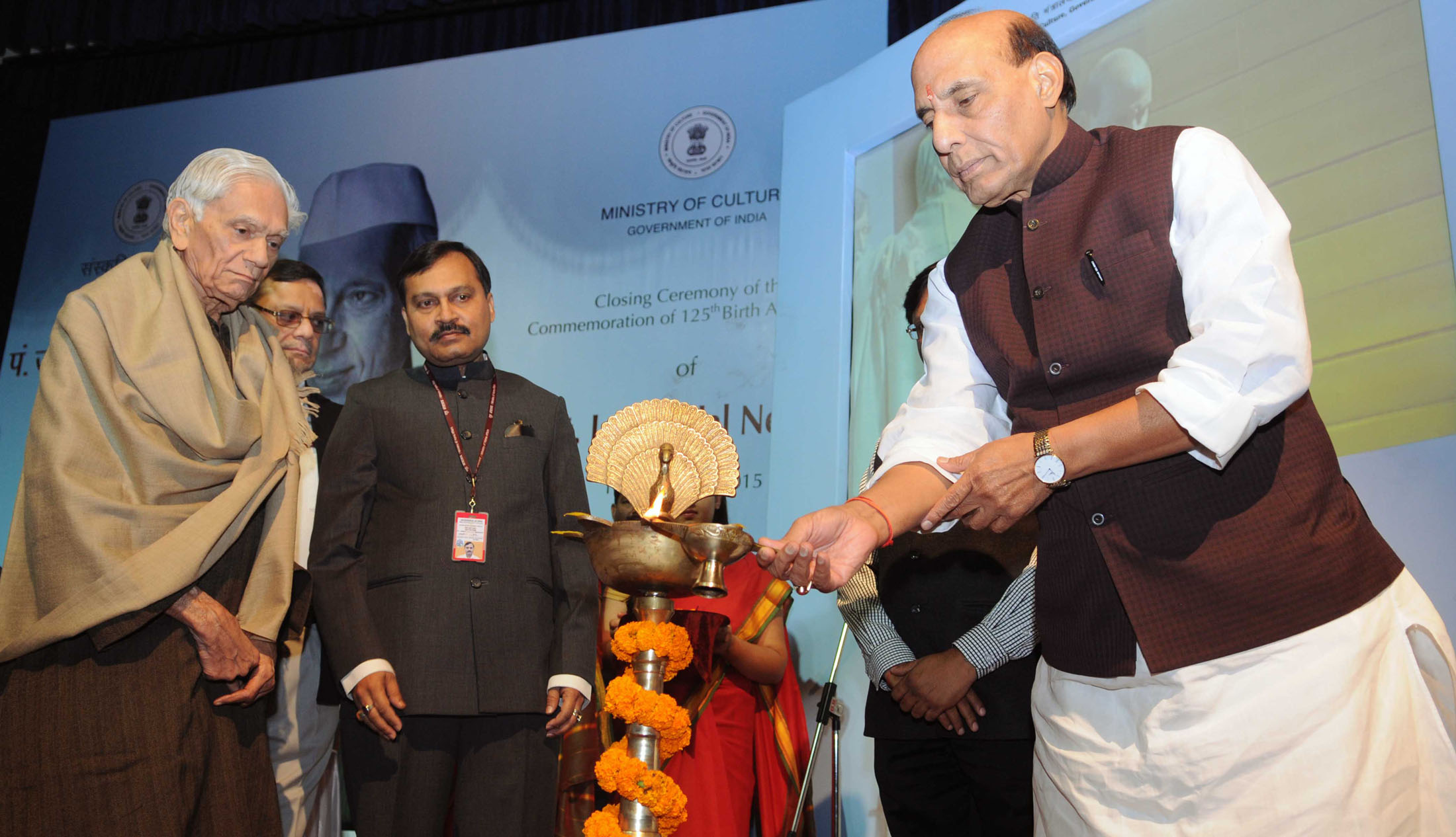 The Union Home Minister, Shri Rajnath Singh lighting the lamp at the function to commemorate the closing ceremony of 125th Birth Anniversary of the former Prime Minister, Pandit Jawaharlal Nehru, in New Delhi on November 14, 2015.