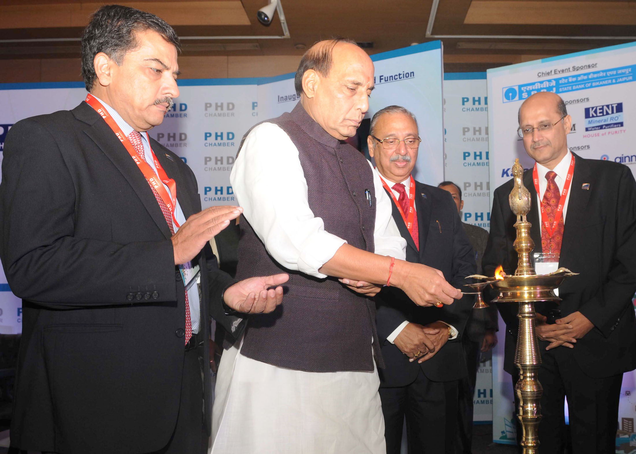 The Union Home Minister, Shri Rajnath Singh lighting the lamp to inaugurate the 110th Annual Session of the PHD Chamber and PHD Annual Awards for Excellence  2015 function, in New Delhi on November 28, 2015.