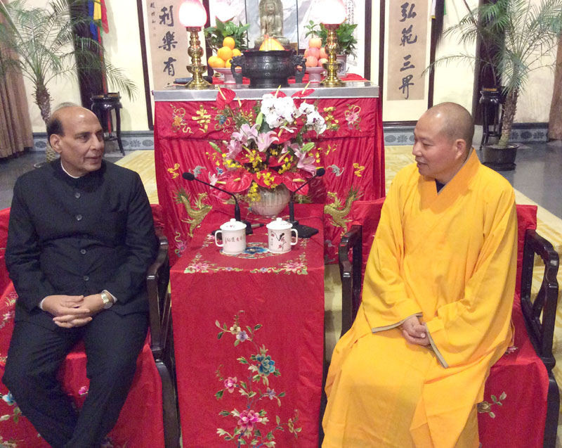 The Union Home Minister, Shri Rajnath Singh meeting the Chief Priest at Jade Buddha temple, in Shanghai on November 23, 2015.