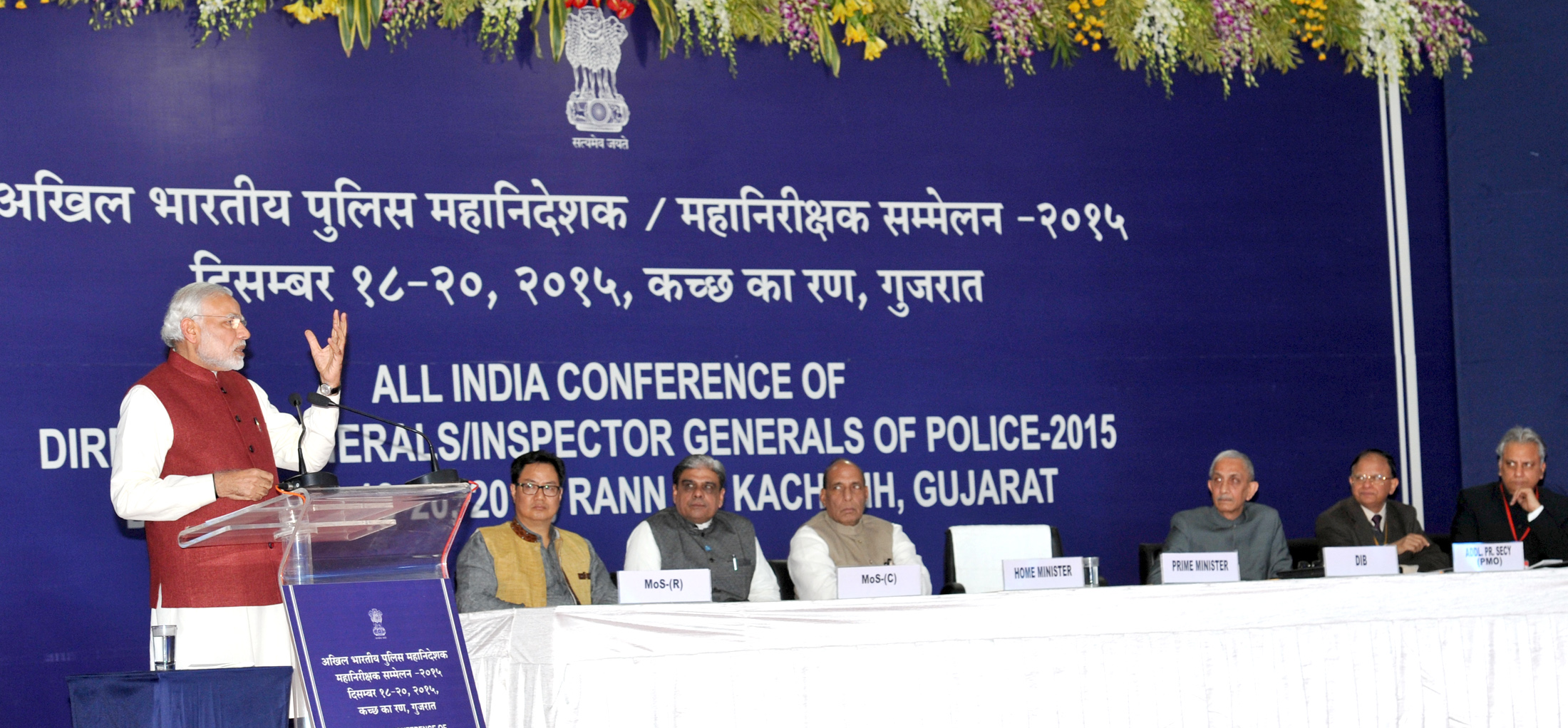 The Prime Minister, Shri Narendra Modi delivering his address on the 3rd and concluding day of the Conference of DGPs, at Dhordo, Kutch, Gujarat on December 20, 2015,  	The Union Home Minister, Shri Rajnath Singh, the Ministers of State for Home Affairs, Shri Kiren Rijiju and Shri Haribhai Parthibhai Chaudhary are also seen.