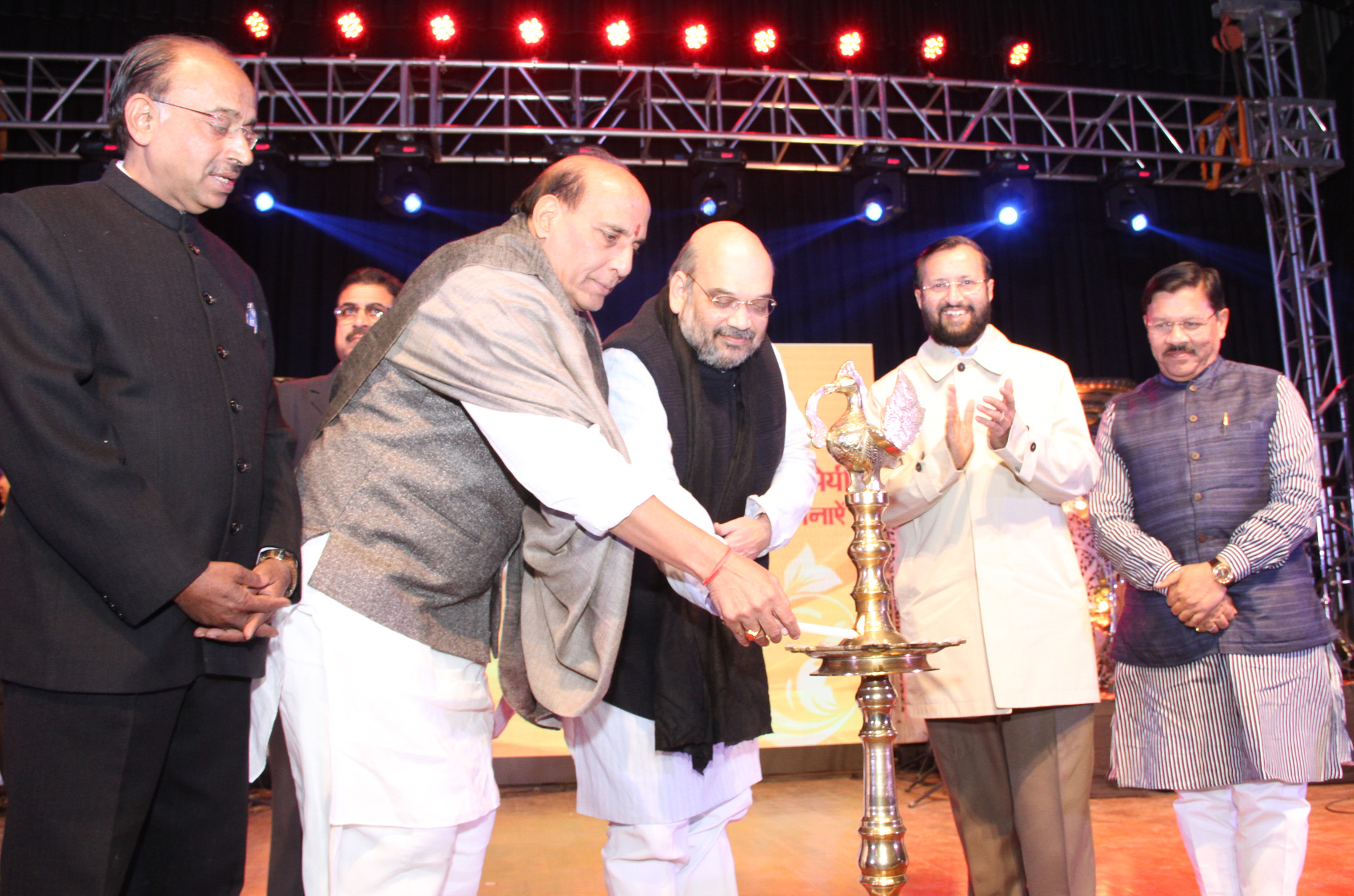 The Union Home Minister, Shri Rajnath Singh lighting the lamp on the occasion of the 91st Birthday celebration of the former Prime Minister, Shri Atal Bihari Vajpayee, in New Delhi on December 25, 2015. 	The Minister of State for Environment, Forest and Climate Change (Independent Charge), Shri Prakash Javadekar and other dignitaries are also seen.