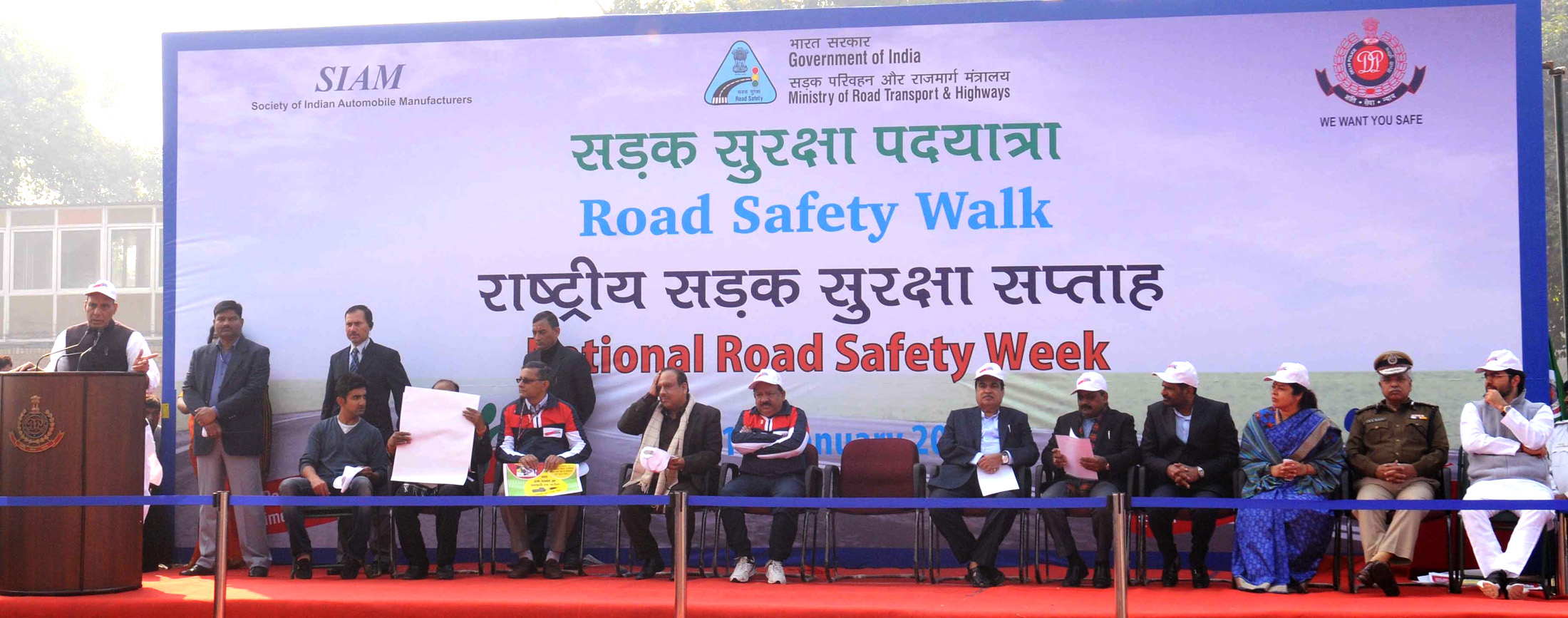 The Union Home Minister, Shri Rajnath Singh addressing at the flag-off ceremony of the Road Safety Walk, in New Delhi on January 11, 2016. 	The Union Minister for Road Transport & Highways and Shipping, Shri Nitin Gadkari, the Union Minister for Science & Technology and Earth Sciences, Dr. Harsh Vardhan and other dignitaries are also seen.