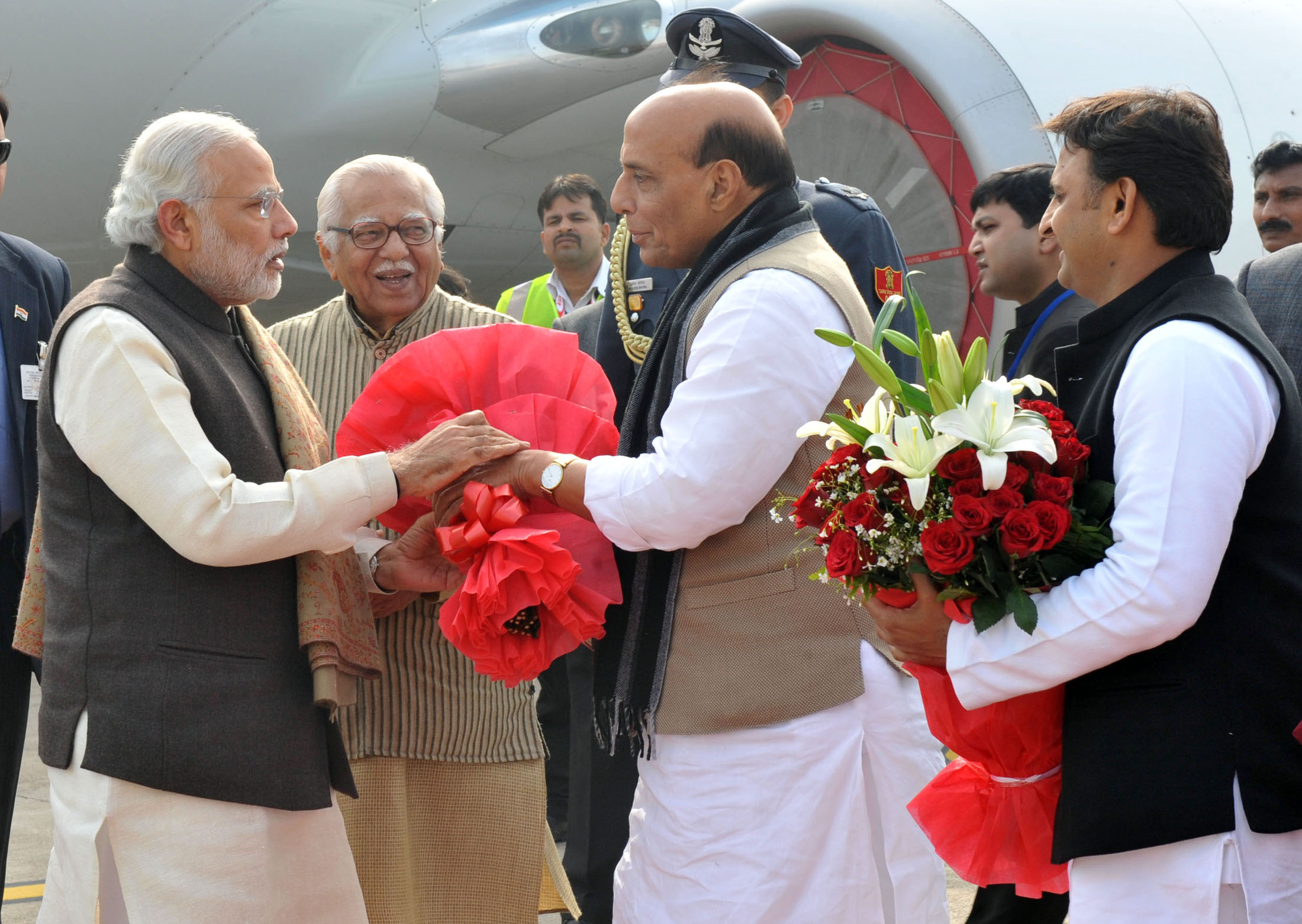 The Prime Minister, Shri Narendra Modi being welcomed by the Union Home Minister, Shri Rajnath Singh on his arrival, at Lucknow airport, in Uttar Pradesh on January 22, 2016. 	The Governor of Uttar Pradesh, Shri Ram Naik and the Chief Minister of Uttar Pradesh, Shri Akhilesh Yadav are also seen.