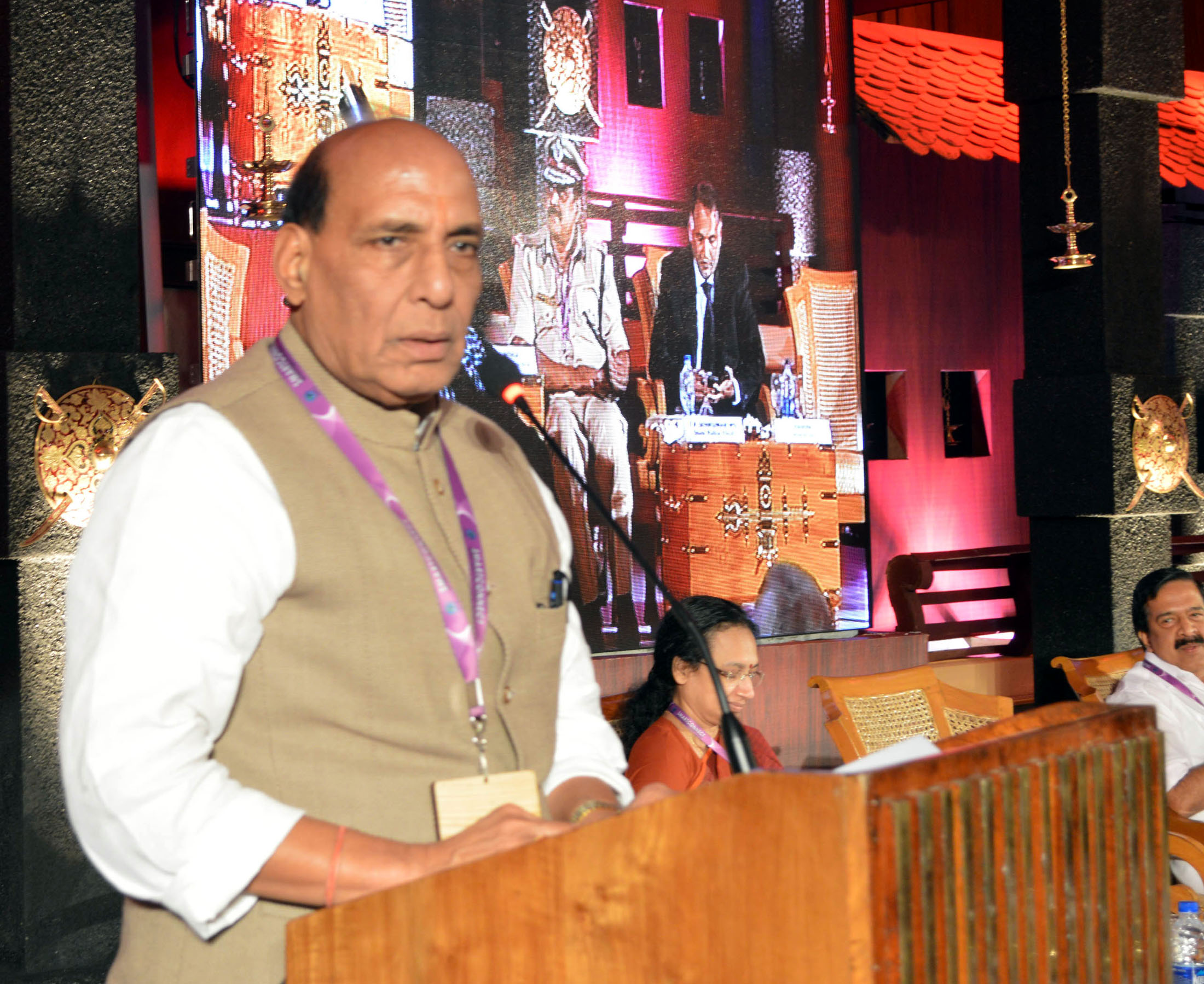 The Union Home Minister, Shri Rajnath Singh addressing the National Conclave on Community Policing, at Kovalam, in Thiruvananthapuram, Kerala on January 27, 2016.  	The Kerala Home Minister, Shri Ramesh Chennithala and the State Home Secretary, Smt. Nalini Netto are also seen.