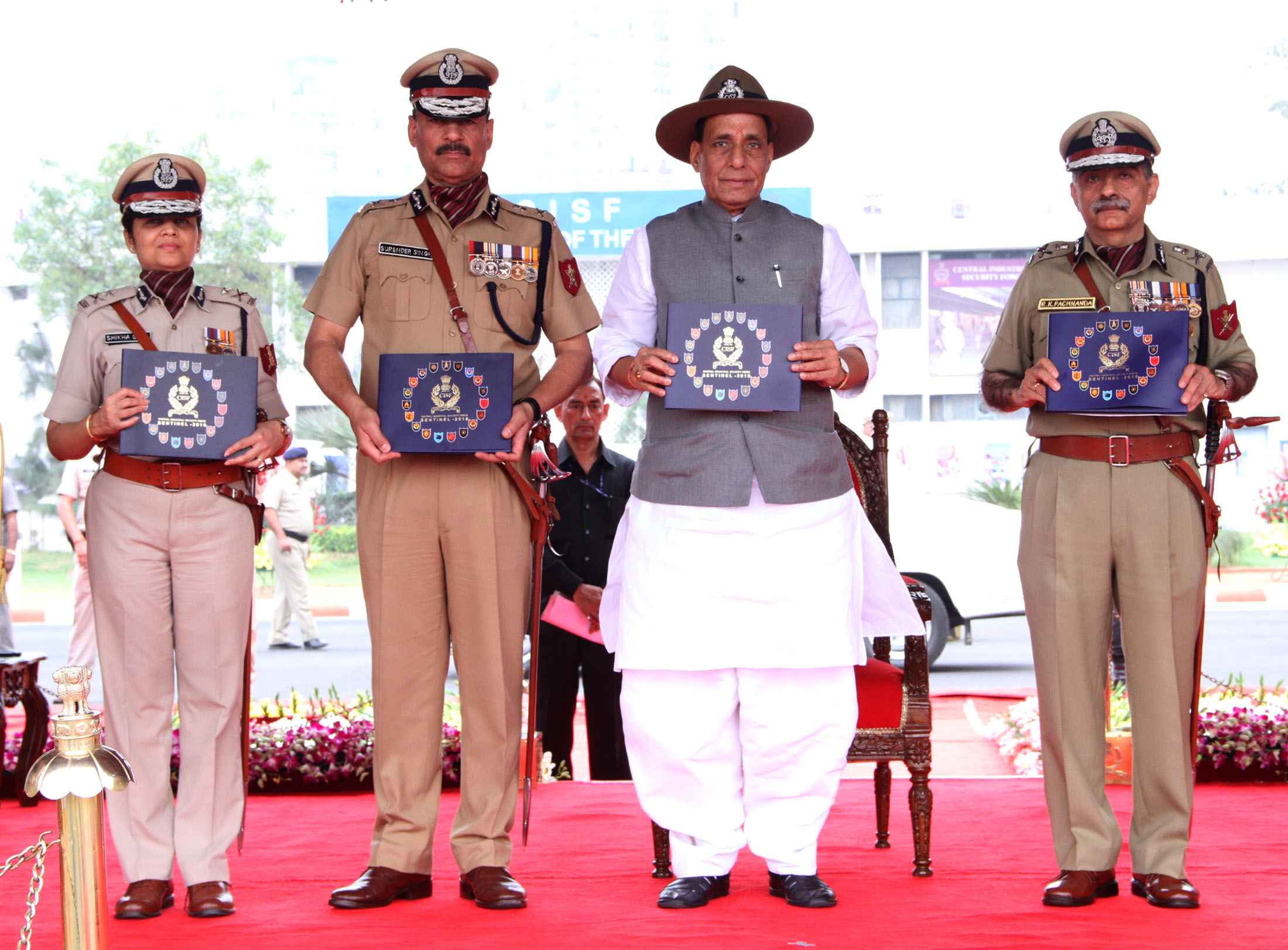The Union Home Minister, Shri Rajnath Singh releasing the magazine 'Sentinel' at the 47th Raising Day function of the CISF, in Ghaziabad on Friday, March 11, 2016.  The Director General, CISF, Shri Surender Singh is also seen.