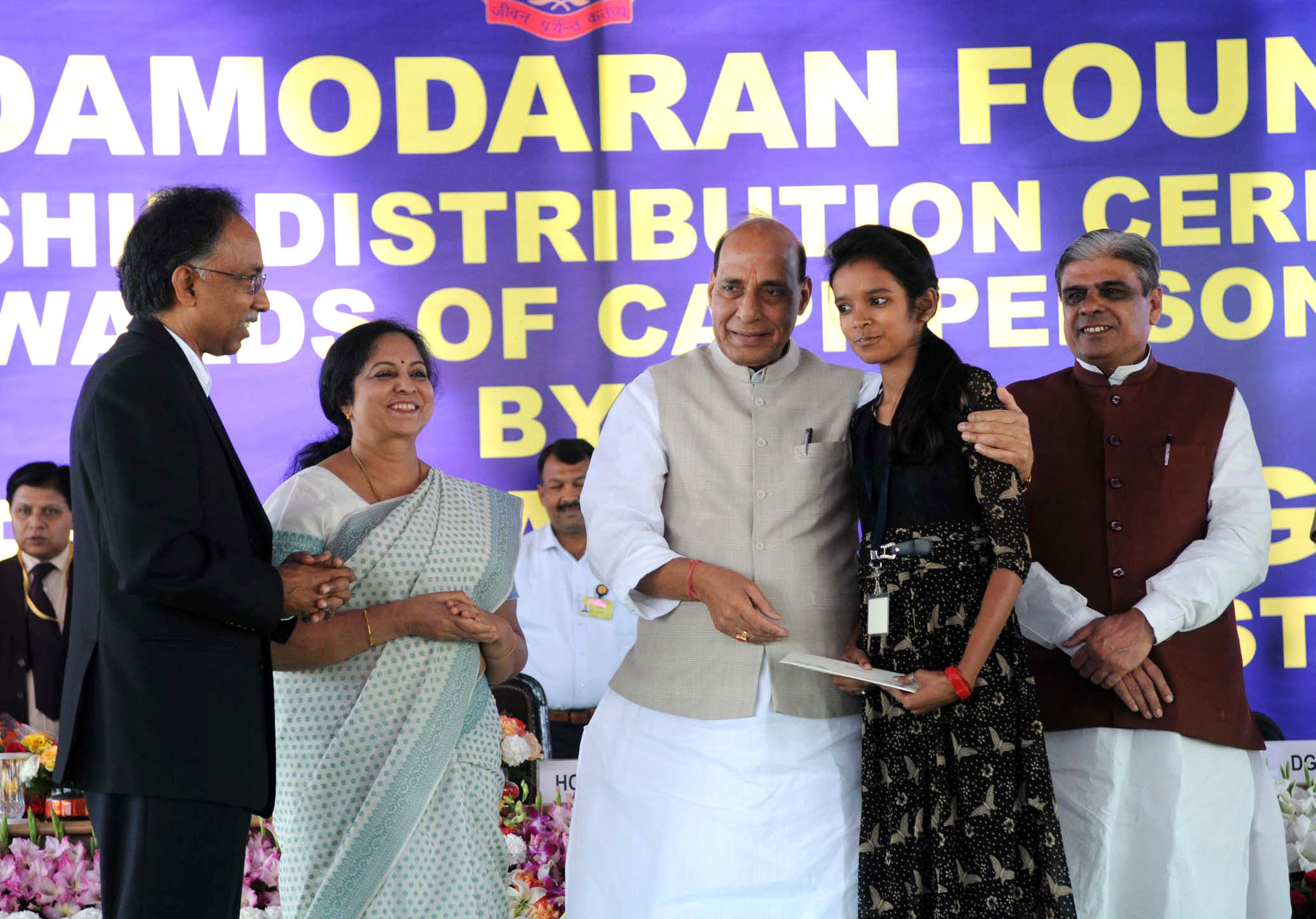 The Union Home Minister, Shri Rajnath Singh distributed the Sarojini Damodaran Foundation Scholarship, at a function, in New Delhi on March 18, 2016. 	The Minister of State for Home Affairs, Shri Haribhai Parthibhai Chaudhary and other dignitaries are also seen.