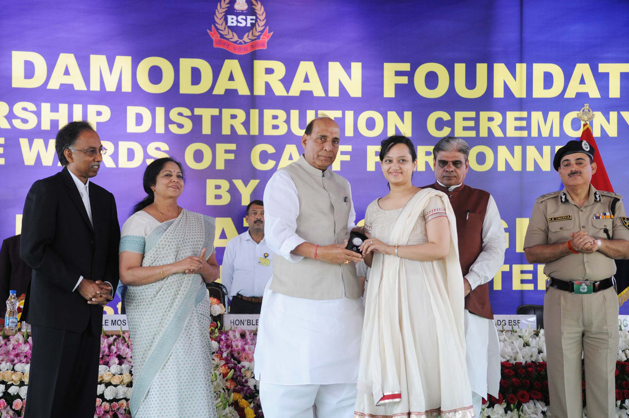 The Union Home Minister, Shri Rajnath Singh distributed the Sarojini Damodaran Foundation Scholarship, at a function, in New Delhi on March 18, 2016. 	The Minister of State for Home Affairs, Shri Haribhai Parthibhai Chaudhary and other dignitaries are also seen.