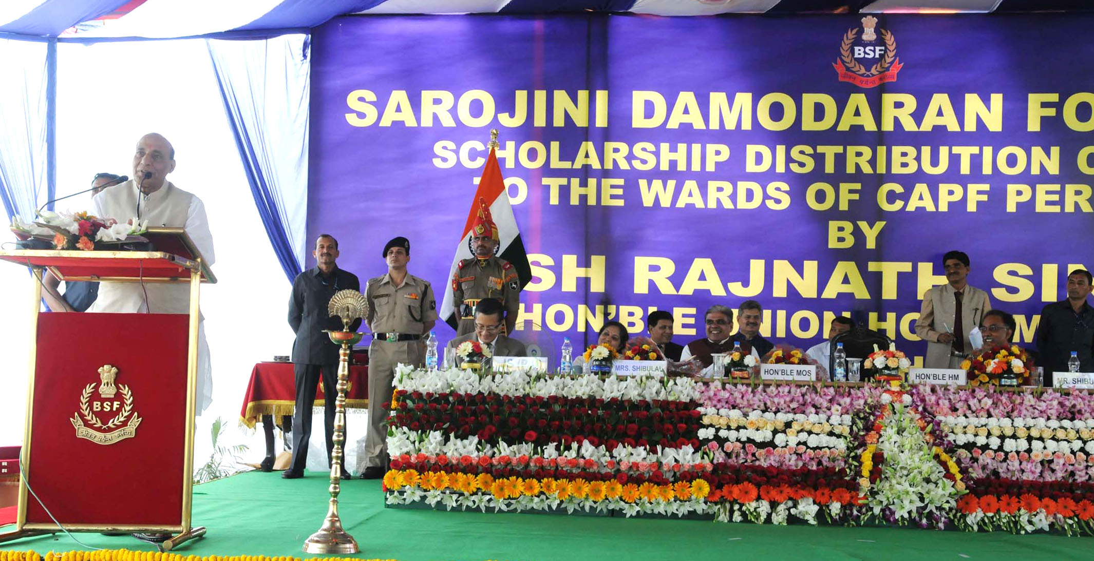 The Union Home Minister, Shri Rajnath Singh addressing at Sarojini Damodaran Foundation Scholarship distribution ceremony, in New Delhi on March 18, 2016. 	The Minister of State for Home Affairs, Shri Haribhai Parthibhai Chaudhary and other dignitaries are also seen.