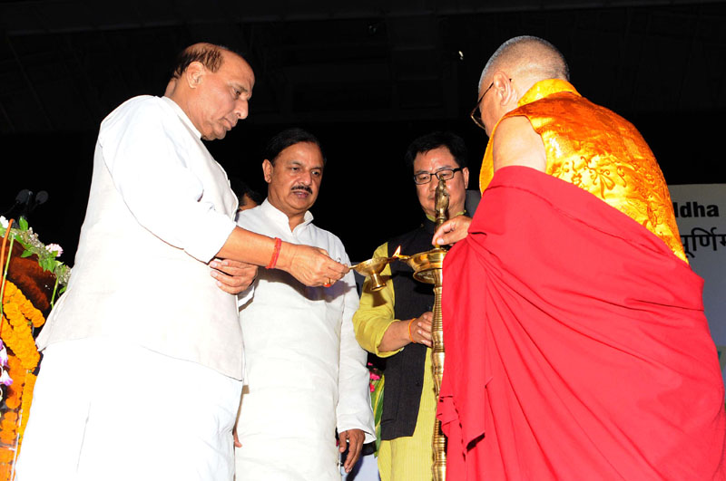 The Union Home Minister, Shri Rajnath Singh lighting the lamp at the International Buddha Poornima Diwas Celebration 2016, in New Delhi on May 21, 2016. 	The Minister of State for Home Affairs, Shri Kiren Rijiju, the Minister of State for Culture (Independent Charge), Tourism (Independent Charge) and Civil Aviation, Dr. Mahesh Sharma and the Secretary General, International Buddhist Confederation, Ven. Lama Lobzang are also seen.