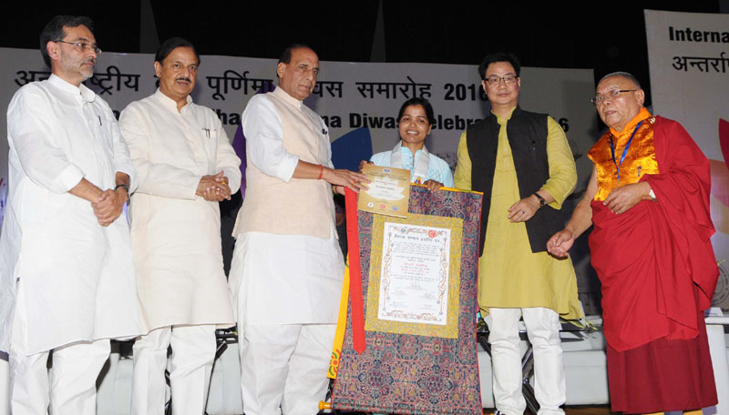 The Union Home Minister, Shri Rajnath Singh presented the certificates at the International Buddha Poornima Diwas Celebration 2016, in New Delhi on May 21, 2016. 	The Minister of State for Home Affairs, Shri Kiren Rijiju, the Minister of State for Culture (Independent Charge), Tourism (Independent Charge) and Civil Aviation, Dr. Mahesh Sharma, the Minister of State for Human Resource Development, Shri Upendra Kushwaha and the Secretary General, International Buddhist Confederation, Ven. Lama Lobzang are also seen.