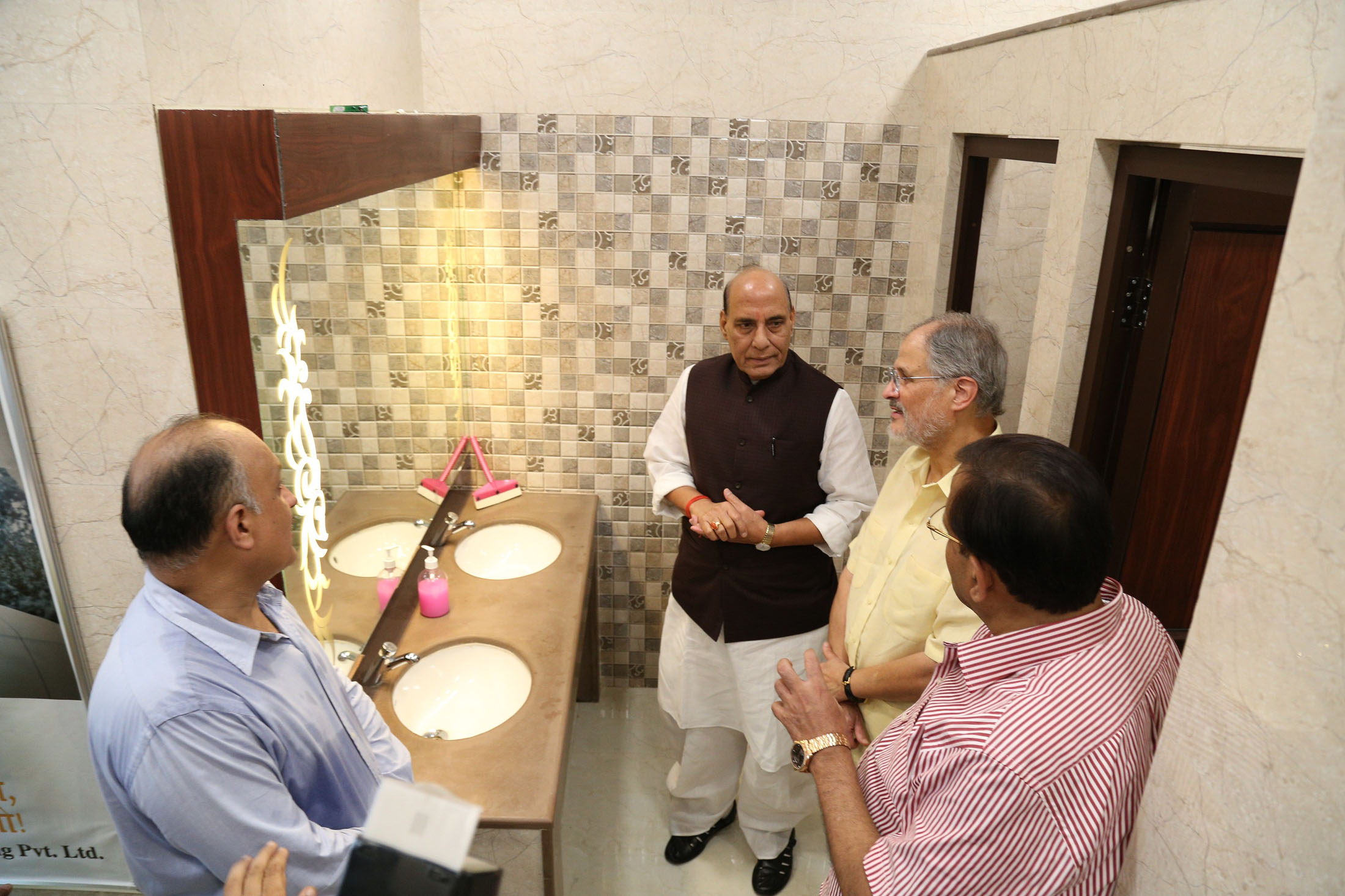 The Union Home Minister, Shri Rajnath Singh inspecting the NDMC's Smart Public Toilet Utility at Rafi Marg-Chelmsford Club, in New Delhi on October 02, 2016. The Lt. Governor of Delhi, Shri Najeeb Jung and the NDMC Chairman, Shri Naresh Kumar are also seen.