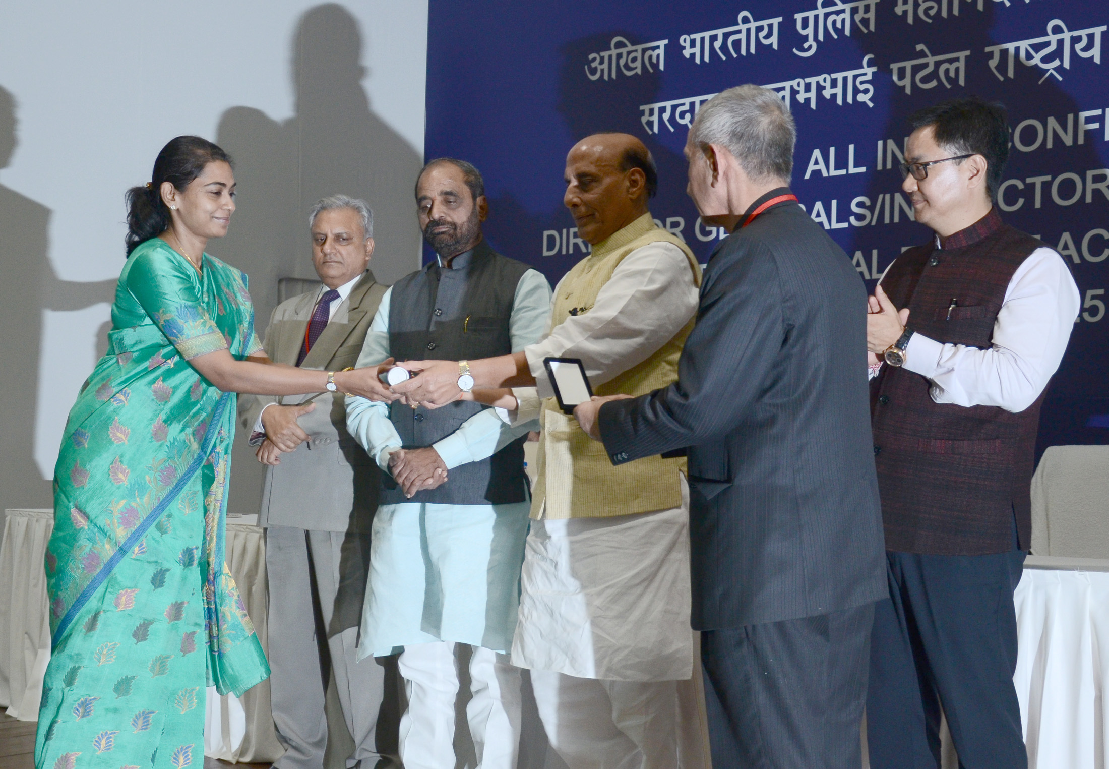 The Union Home Minister, Shri Rajnath Singh presenting the Police Medals for meritorious service to the officers of Intelligence Bureau (IB), at the inauguration of the All India Conference of DGPs/IGPs, 2016, at Sardar Vallabhbhai Patel National Police Academy, in Hyderabad on November 25, 2016. 	The Ministers of State for Home Affairs, Shri Hansraj Gangaram Ahir & Shri Kiren Rijiju and other dignitaries are also seen.