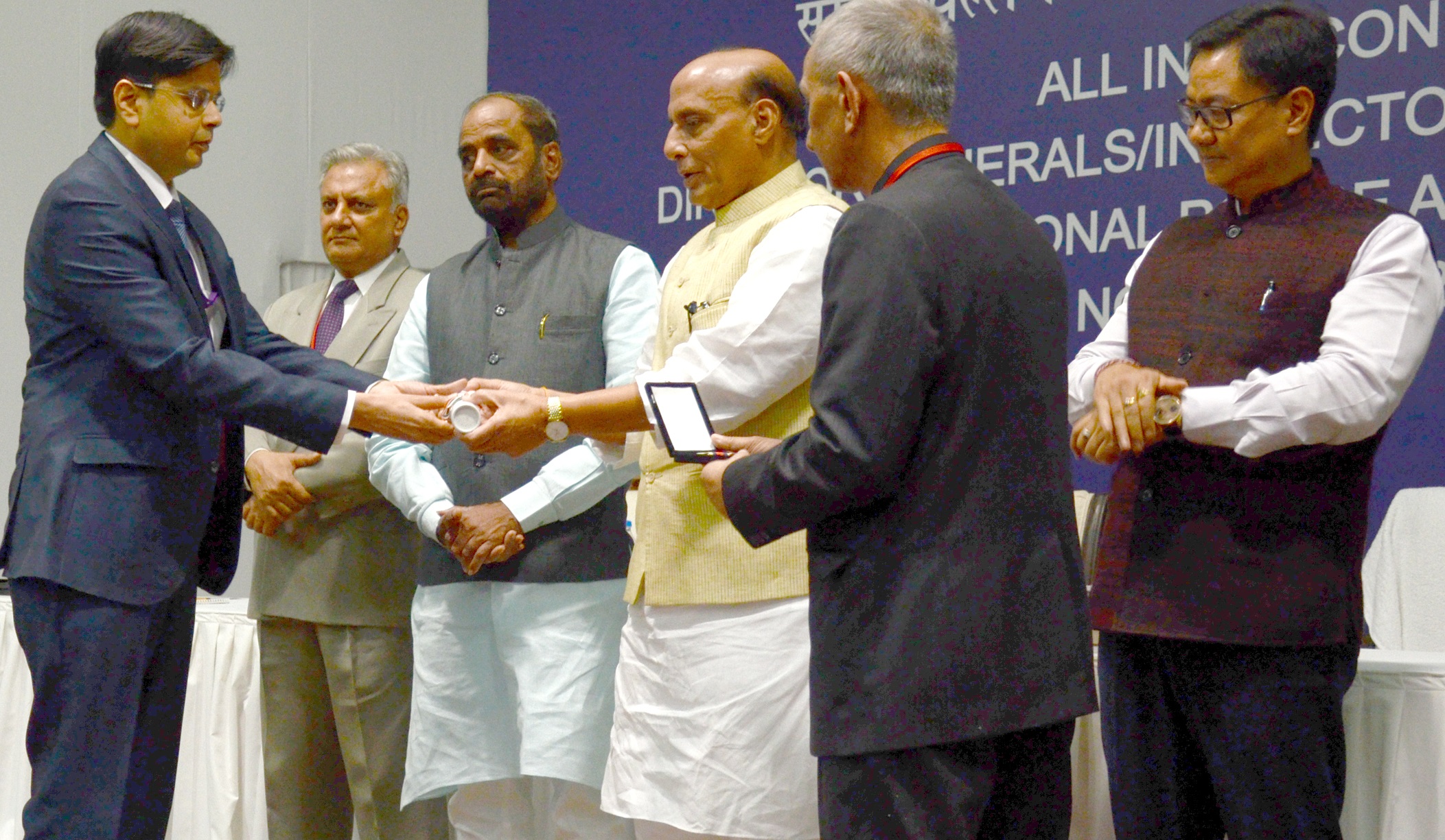 The Union Home Minister, Shri Rajnath Singh presenting the Police Medals for meritorious service to the officers of Intelligence Bureau (IB), at the inauguration of the All India Conference of DGPs/IGPs, 2016, at Sardar Vallabhbhai Patel National Police Academy, in Hyderabad on November 25, 2016. 	The Ministers of State for Home Affairs, Shri Hansraj Gangaram Ahir & Shri Kiren Rijiju and other dignitaries are also seen.