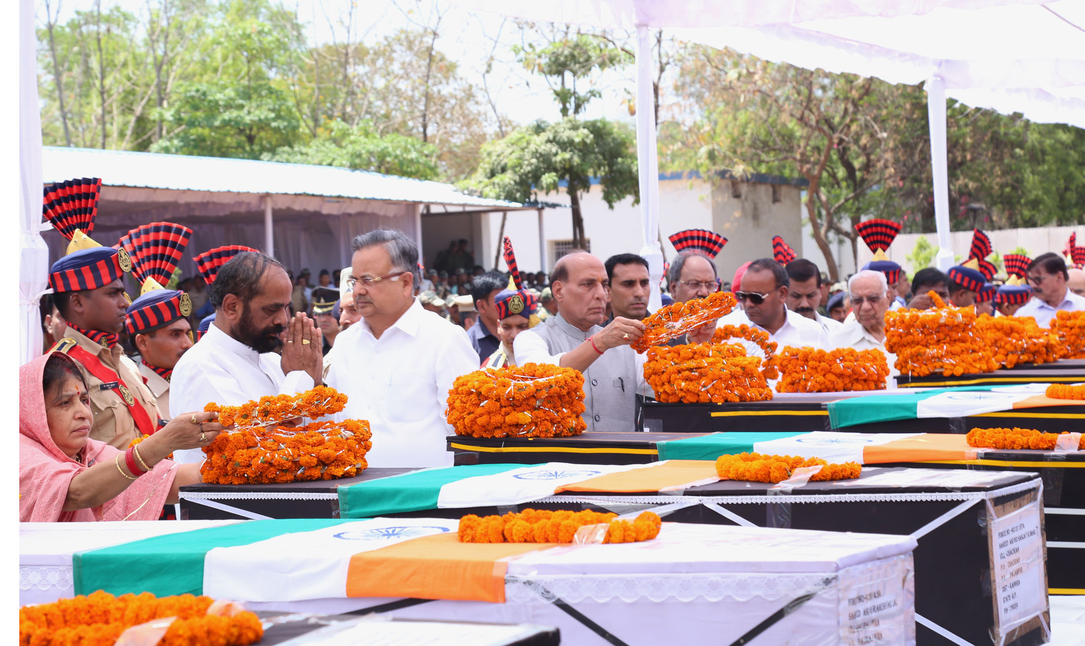 The Union Home Minister, Shri Rajnath Singh paying tributes to the martyred CRPF personnel, in Raipur, Chhattisgarh on April 25, 2017. The Chief Minister of Chhattisgarh, Dr. Raman Singh and the Minister of State for Home Affairs, Shri Hansraj Gangaram Ahir are also seen.