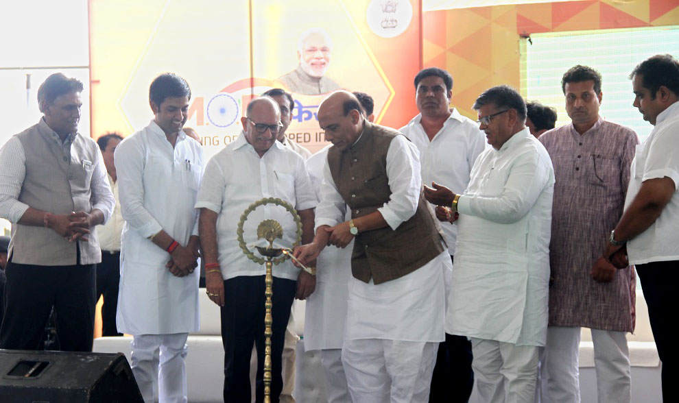 The Union Home Minister, Shri Rajnath Singh lighting the lamp to inaugurate the MODI FEST (Making of Developed India Festival), at Muhana Mandi, Jaipur on June 09, 2017.