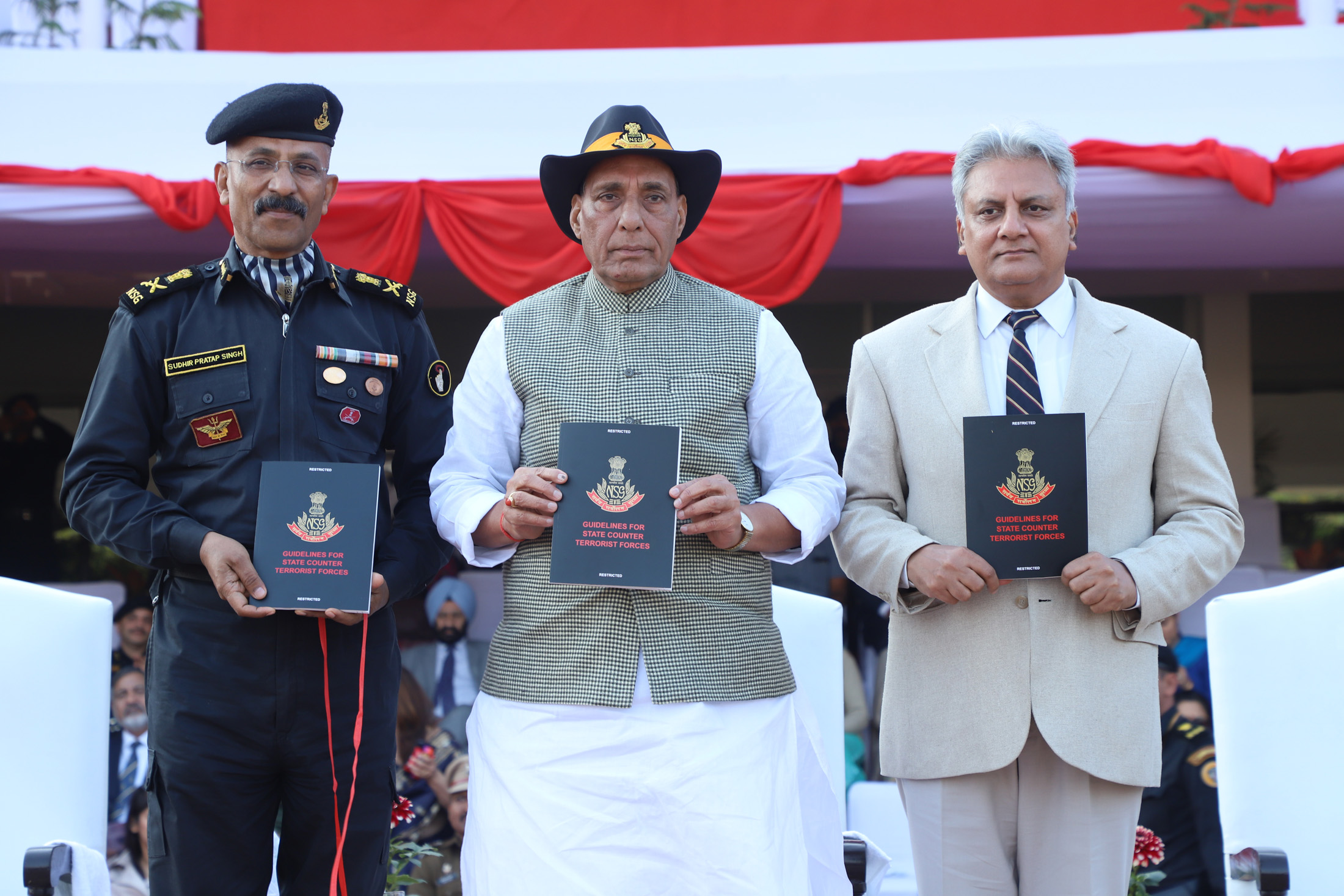 The Union Home Minister, Shri Rajnath Singh releasing a compendium, during the Closing Ceremony of the 8th All India Police Commando Competition, at Manesar, Gurugram, in Haryana on January 20, 2018.  The Director General, NSG, Shri Sudhir Pratap Singh and the Director, IB, Shri Rajiv Jain are also seen.