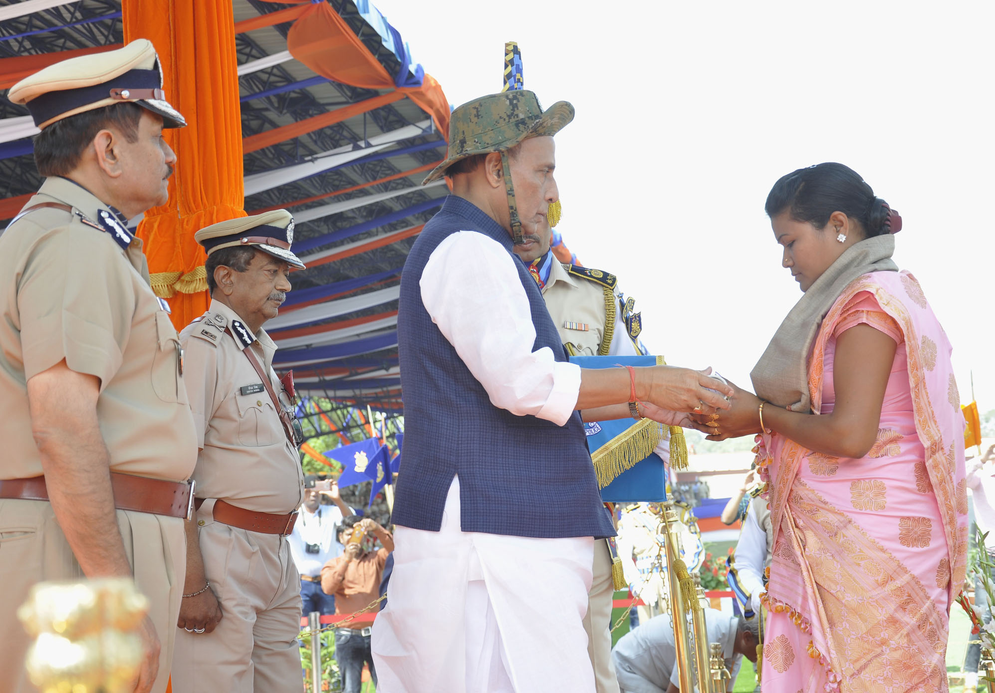 The Union Home Minister, Shri Rajnath Singh presenting Police Medals for Gallantry on the occasion of CRPFs 79th Raising Day Parade, in Gurugram, Haryana in March 24, 2018.