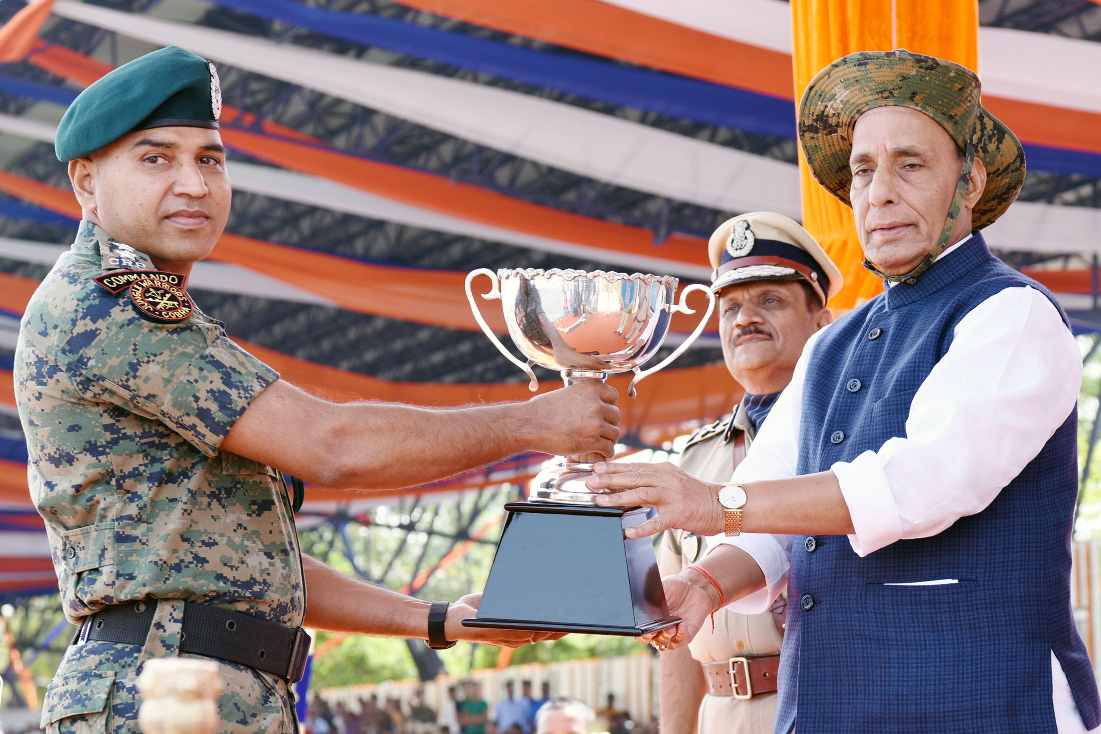 The Union Home Minister, Shri Rajnath Singh presenting trophies on the occasion of CRPFs 79th Raising Day Parade, in Gurugram, Haryana in March 24, 2018.