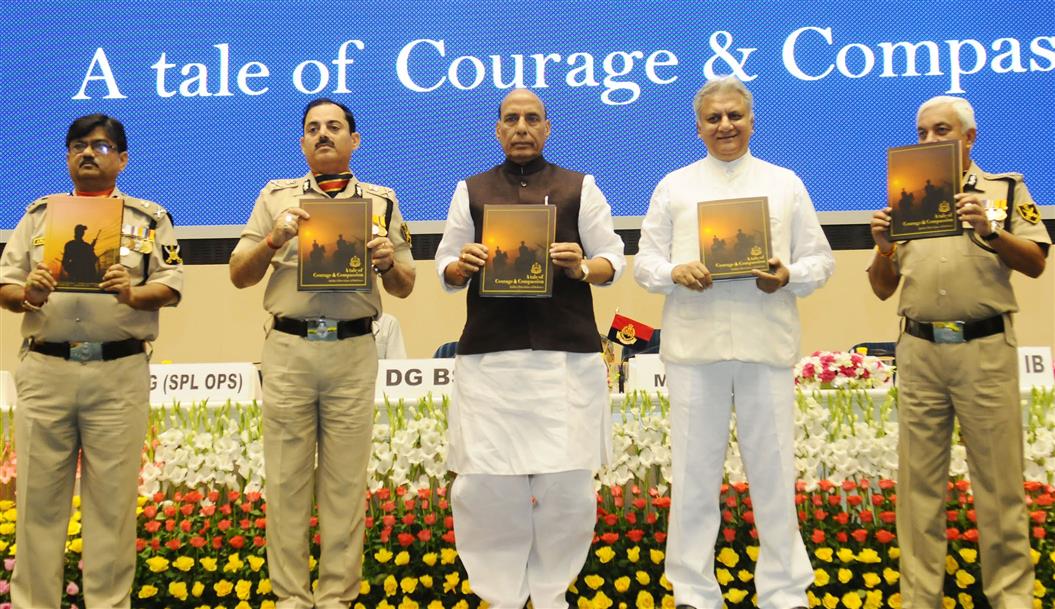 Shri Rajnath Singh releasing the coffee table book titled ‘A tale of Courage & Compassion’, at the Investiture Ceremony of Border Security Force (BSF), in New Delhi